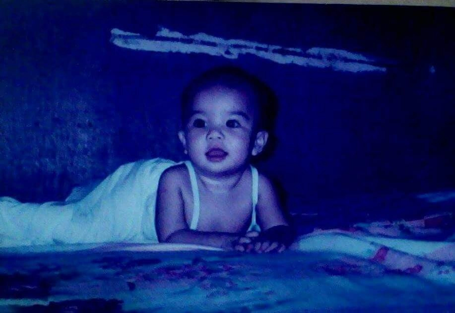 Childhood photo of me reflecting on my life journey, a moment of innocence and self-discovery.