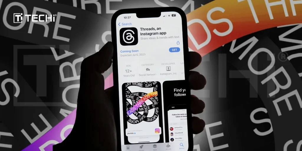 Person holding a smartphone displaying the Threads app interface.